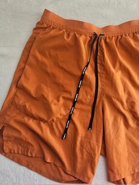 Nike Men's Burnt Orange Athletic Shorts with Black Drawcord